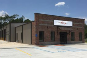 Façade of a Superheat Baton Rouge building front with the old logo